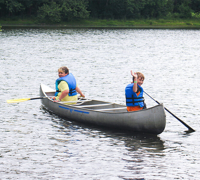 2 scouts canoeing at custaloga town