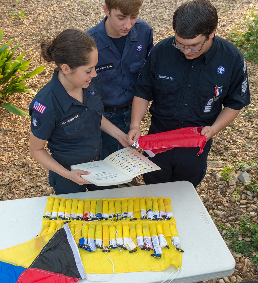 Sea scouts identifying flags